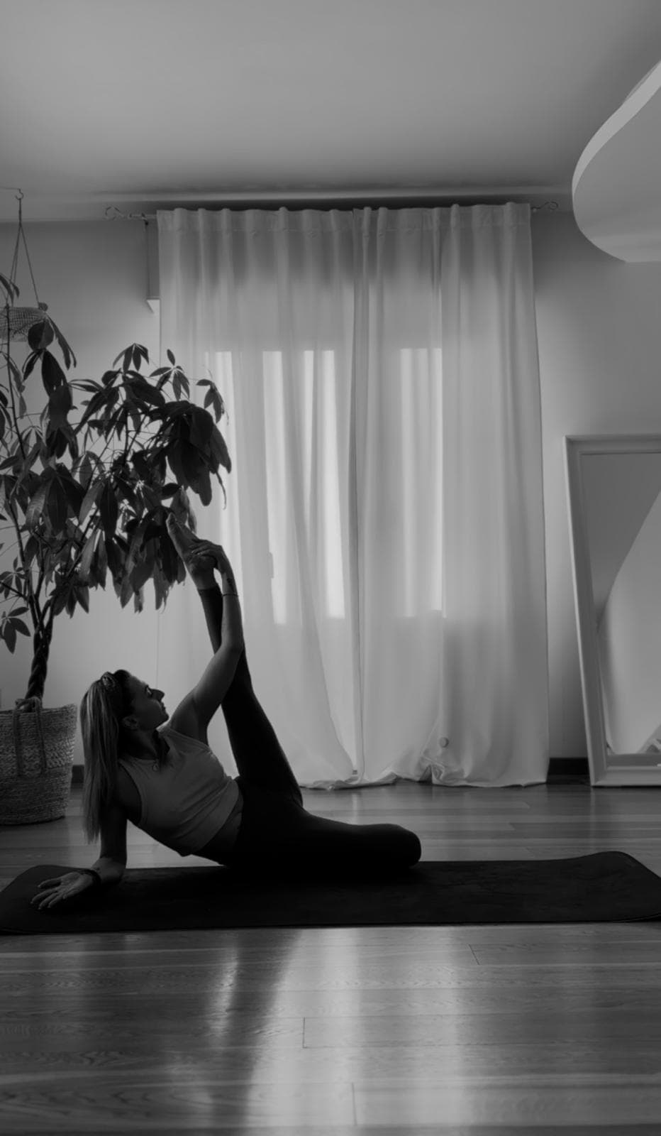 Silvia in a yoga practice, black and white